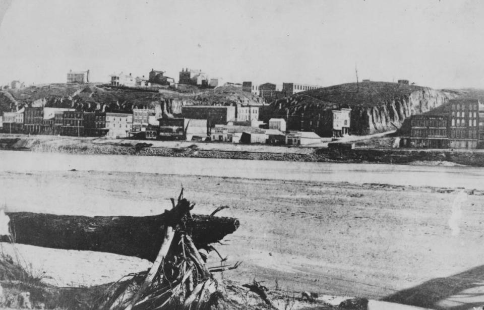 In Kansas City’s early days, the bluffs towered above the riverfront buildings.