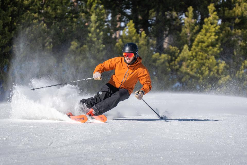 A skier enjoys opening day Nov. 19, 2021, at Eldora Mountain near Nederland, Colo.