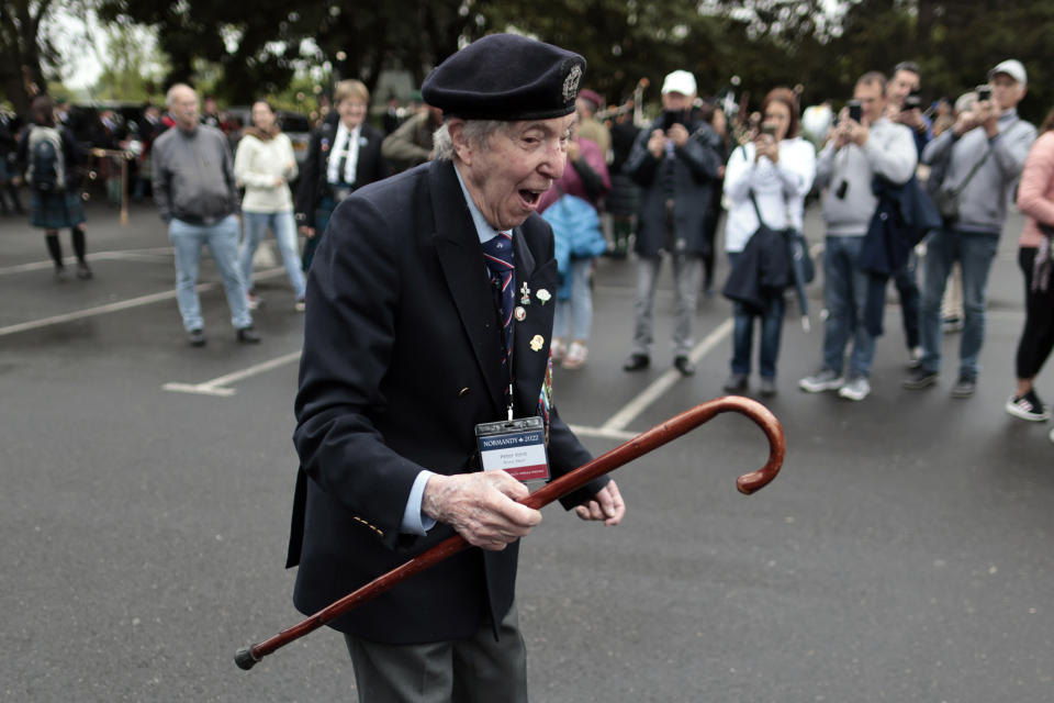 British veteran Peter Kent of the Royal Navy arrives to the ceremony at Pegasus Bridge, in Ranville, Normandy, Sunday, June, 5, 2022. On Monday, the Normandy American Cemetery and Memorial, home to the gravesites of 9,386 who died fighting on D-Day and in the operations that followed, will host U.S. veterans and thousands of visitors in its first major public ceremony since 2019. (AP Photo/Jeremias Gonzalez)