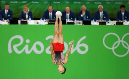 2016 Rio Olympics - Trampoline Gymnastics - Preliminary - Men's Qualification - Rio Olympic Arena - Rio de Janeiro, Brazil - 13/08/2016. Uladzislau Hancharou (BLR) of Belarus competes. REUTERS/Ruben Sprich