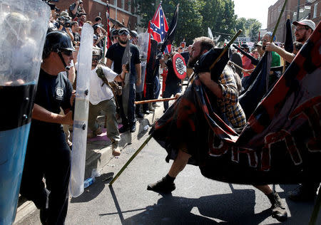 FILE PHOTO: White nationalists clash with counter protesters at a rally in Charlottesville, Virginia, U.S., August 12, 2017. REUTERS/Joshua Roberts/File Photo