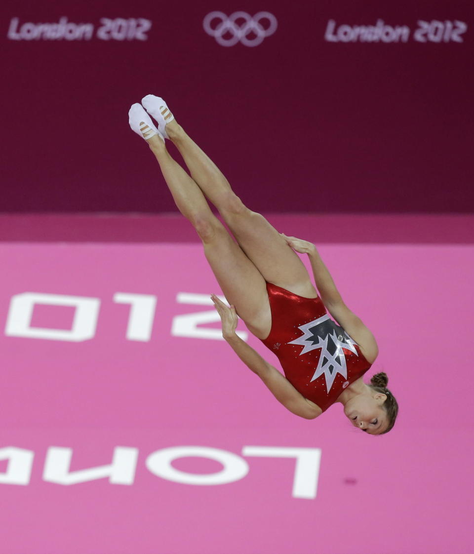 Canada's Rosannagh Maclennan performs during the women's trampoline qualification at the 2012 Summer Olympics, Friday, Aug. 3, 2012, in London. (AP Photo/Julie Jacobson)