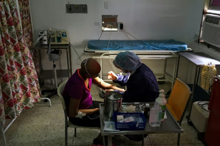 From broken water pipes to a single functioning elevator and vermin in the hallways, Caracas's J.M. de los Rios hospital has a long list of problems, according to doctors