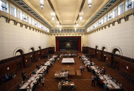 European Parliamentary election ballot papers, from the local area, are counted, in Southampton, southern England May 25, 2014. REUTERS/Luke MacGregor