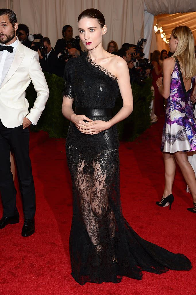  <p class="MsoNormal"><span>“The Girl With the Dragon Tattoo” star Rooney Mara was the girl who showed off some serious skin Monday night in her one-shoulder lacey black Givenchy gown, which was sheer from her upper-thighs down. As usual, the 27-year-old opted for a severe hairstyle and decided to skip any jewelry.</span></p>