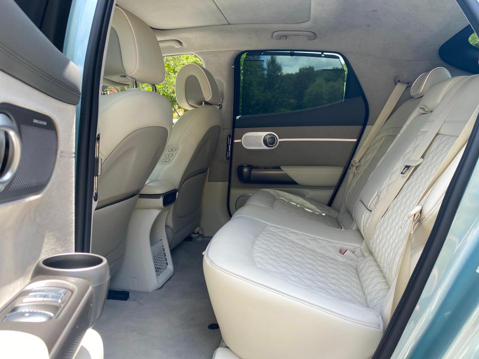 The rear seats of a 2024 Genesis GV60 EV.