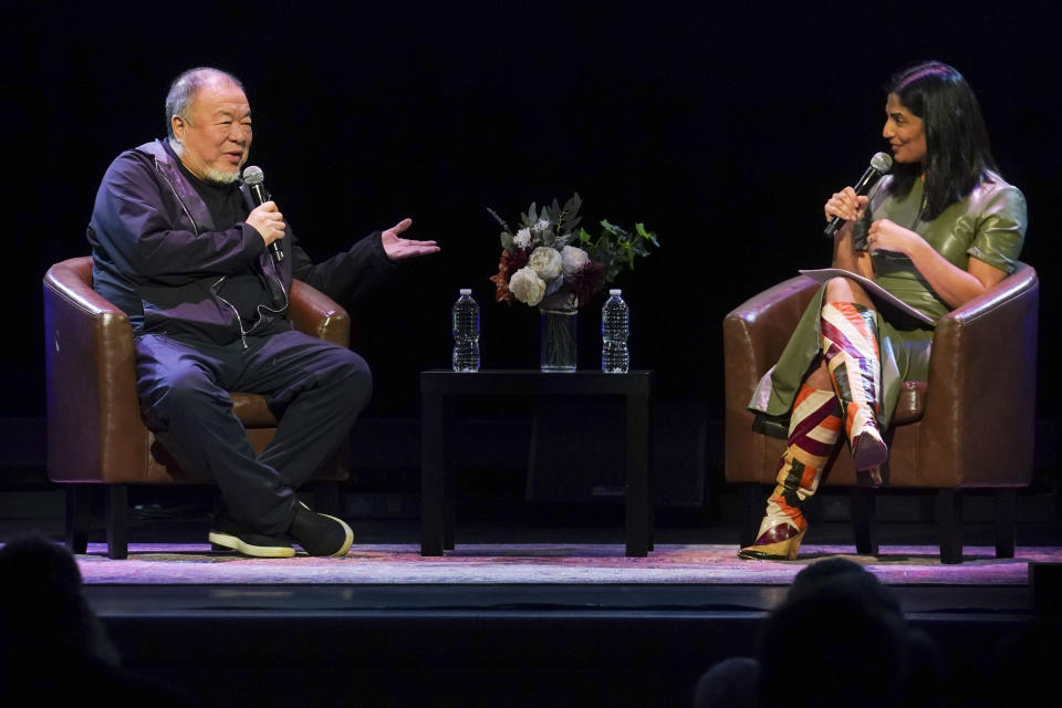 Visual artist and activist Ai Weiwei, left, speaks during a conversation with author Mira Jacob, right, on stage at The Town Hall theatre, Tuesday, Jan. 23, 2024, in New York. Ai was in New York to discuss his new book, the graphic memoir “Zodiac,” structured around the animals of the Chinese Zodiac, with additional references to cats. (AP Photo/Bebeto Matthews)