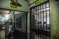 <p>Gates on classroom doors inside one of the schools in the capital Tegucigalpa, in a neighbourhood controlled by the Mara-18, a<br>very powerfull gang. It is also well known as “army of kids”, because of the young age of its members, which are often recruited inside the schools. (Photo: Francesca Volpi) </p>