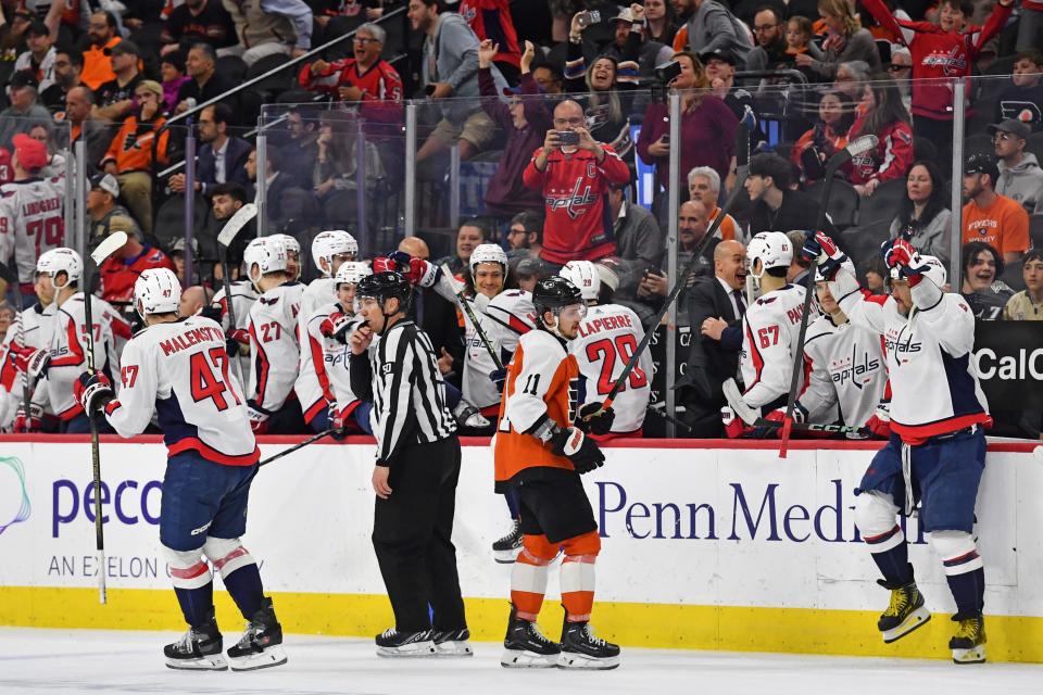 The Washington Capitals celebrate their win against the Philadelphia Flyers, which locked up the Eastern Conference's final playoff spot.