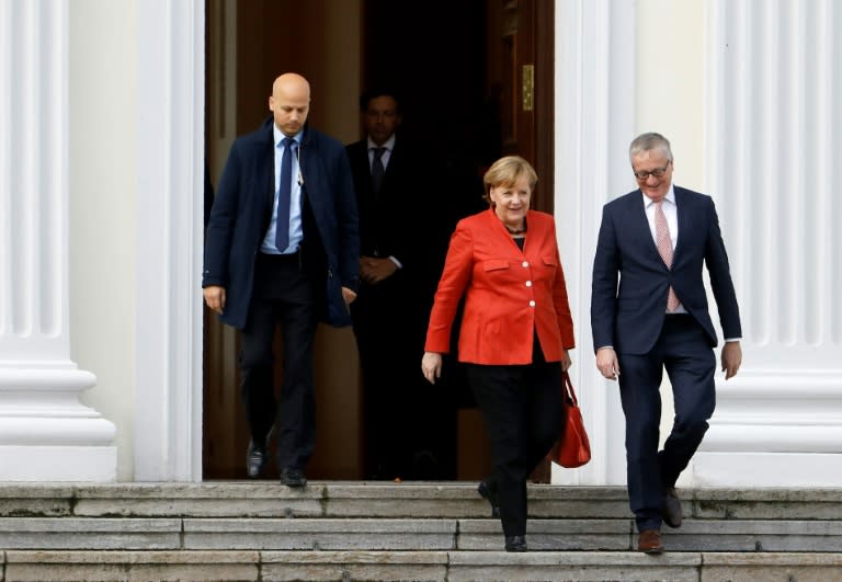 German Chancellor Angela Merkel leaves the presidential residence Bellevue Castle in Berlin