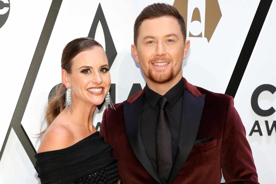 <p>Jason Kempin/Getty</p> Gabi Dugal McCreery and Scotty McCreery attend the 55th annual Country Music Association awards on November 10, 2021 in Nashville, Tennessee. 