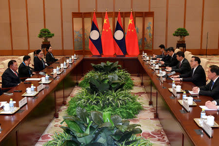 Laos' President Bounnhang Vorachith attends a meeting with Chinese Premier Li Keqiang at the Diaoyutai State Guesthouse in Beijing, China, April 25, 2019. Parker Song/Pool via REUTERS