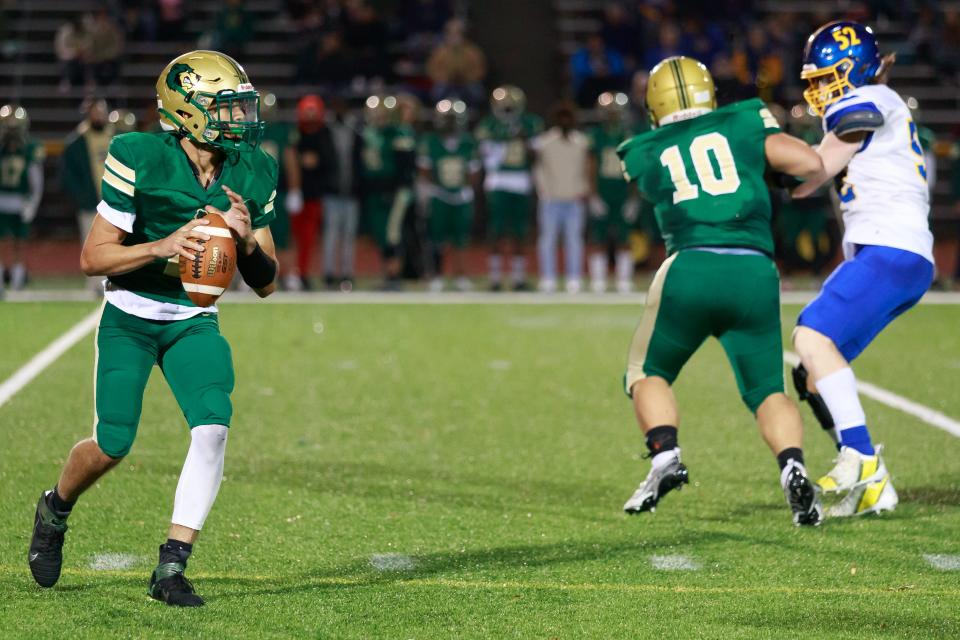 GNB Voc Tech’s Cam Lynch looks downfield during the State Vocational Large semifinal against Assabet.