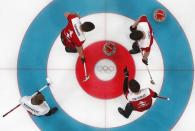 Curling - Pyeongchang 2018 Winter Olympics - Men's Bronze Medal Match - Switzerland v Canada - Gangneung Curling Center - Gangneung, South Korea - February 23, 2018 - Lead Valentin Tanner, skip Peter de Cruz and third Claudio Paetz of Switzerland in action. REUTERS/Cathal McNaughton