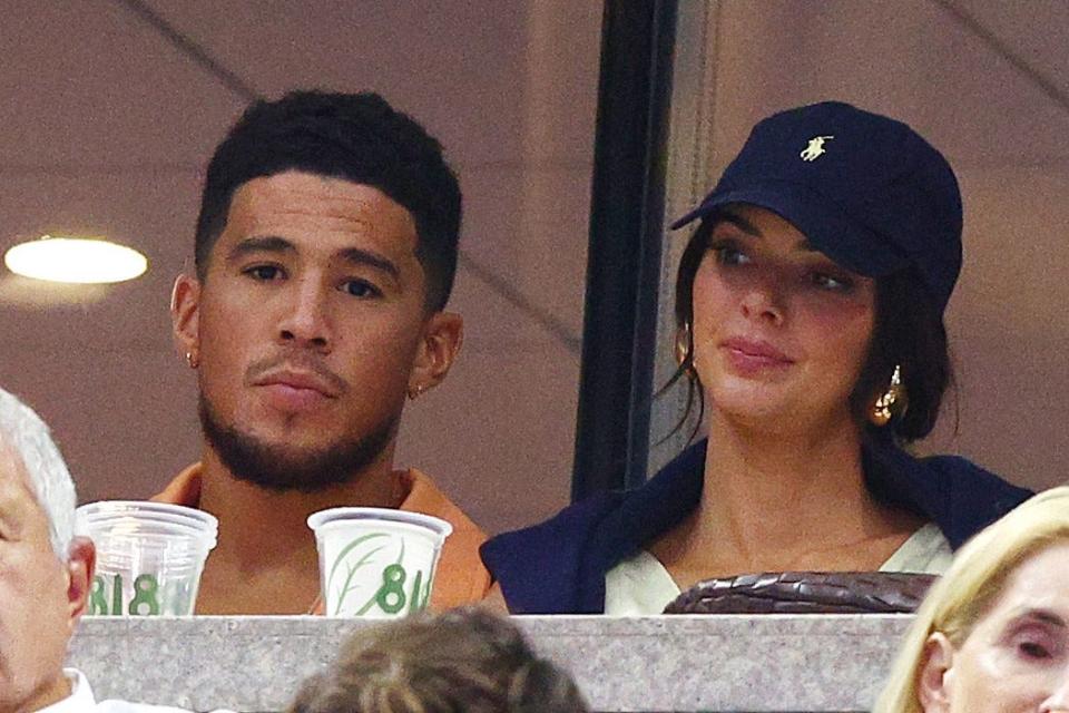 NEW YORK, NEW YORK - SEPTEMBER 11: Devin Booker and Kendall Jenner look on during the Men's Singles Final match between Casper Ruud of Norway and Carlos Alcaraz of Spain on Day 14 of the 2022 US Open at USTA Billie Jean King National Tennis Center on Sept. 11, 2022 in the Flushing neighborhood of the Queens borough of New York City.