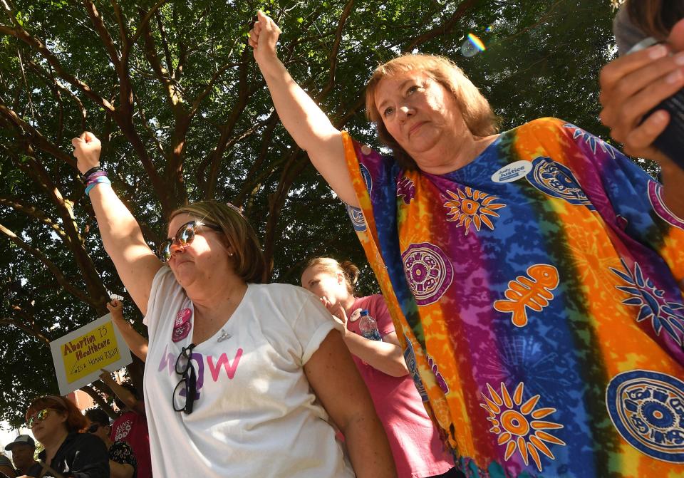 Lynn Shoemaker with WOW and hundreds of others came together at Innes Park near Thalian Hall in downtown Wilmington, N.C. June 24, 2022. Protesters gathered following the U.S. Supreme Court’s Friday morning decision that overturned Roe v. Wade and eliminated the constitutional right to an abortion for Americans.  KEN BLEVINS/STARNEWS