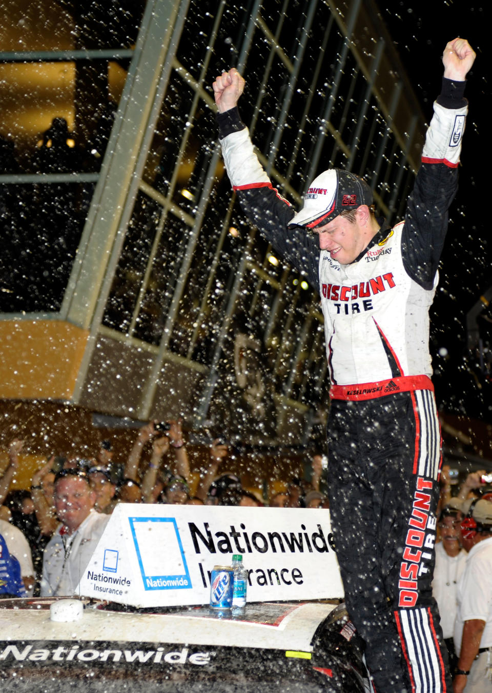 HOMESTEAD, FL - NOVEMBER 19: Brad Keselowski, driver of the #22 Discount Tire Dodge, celebrates after winning the NASCAR Nationwide Series Ford 300 at Homestead-Miami Speedway on November 19, 2011 in Homestead, Florida. (Photo by John Harrelson/Getty Images for NASCAR)