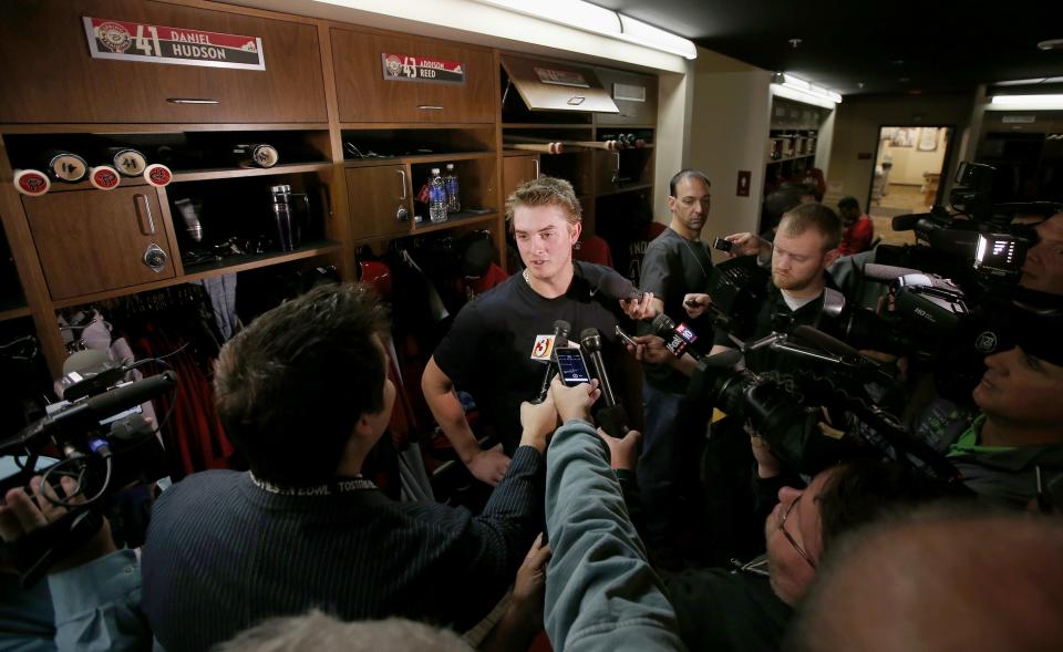 Arizona Diamondbacks' Addison Reed talks with reporters in the clubhouse as pitchers and catchers report to MLB spring training baseball facilities, Thursday, Feb. 6, 2014, in Scottsdale, Ariz. (AP Photo/Ross D. Franklin)