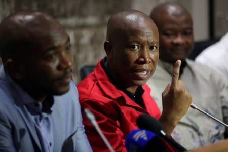FILE PHOTO: Julius Malema, leader of the opposition Economic Freedom Fighters (EFF) party, speaks during a media briefing at Parliament in Cape Town, South Africa, February 12, 2018. REUTERS/Sumaya Hisham/File Photo