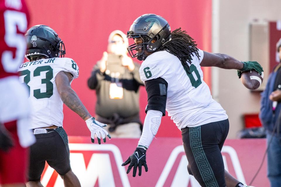 Michigan State tight end Maliq Carr reacts after scoring a go-ahead touchdown during the second half against Indiana, Saturday, Nov. 18, 2023, in Bloomington, Ind.