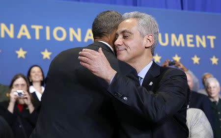 U.S. President Barack Obama and Chicago Mayor Rahm Emanuel hug during an event in the Pullman neighborhood of Chicago February 19, 2015. REUTERS/Kevin Lamarque