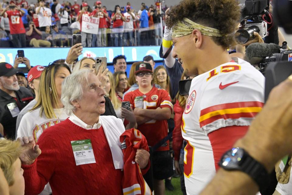 Mandatory Credit: Photo by Jayne Kamin-Oncea/AP/Shutterstock (13631838aj) Actor Henry Winkler, left, speaks with Kansas City Chiefs quarterback Patrick Mahomes prior to an NFL football game between Chiefs and the Los Angeles Chargers, in Inglewood, Calif Chiefs Chargers Football, Inglewood, United States - 20 Nov 2022