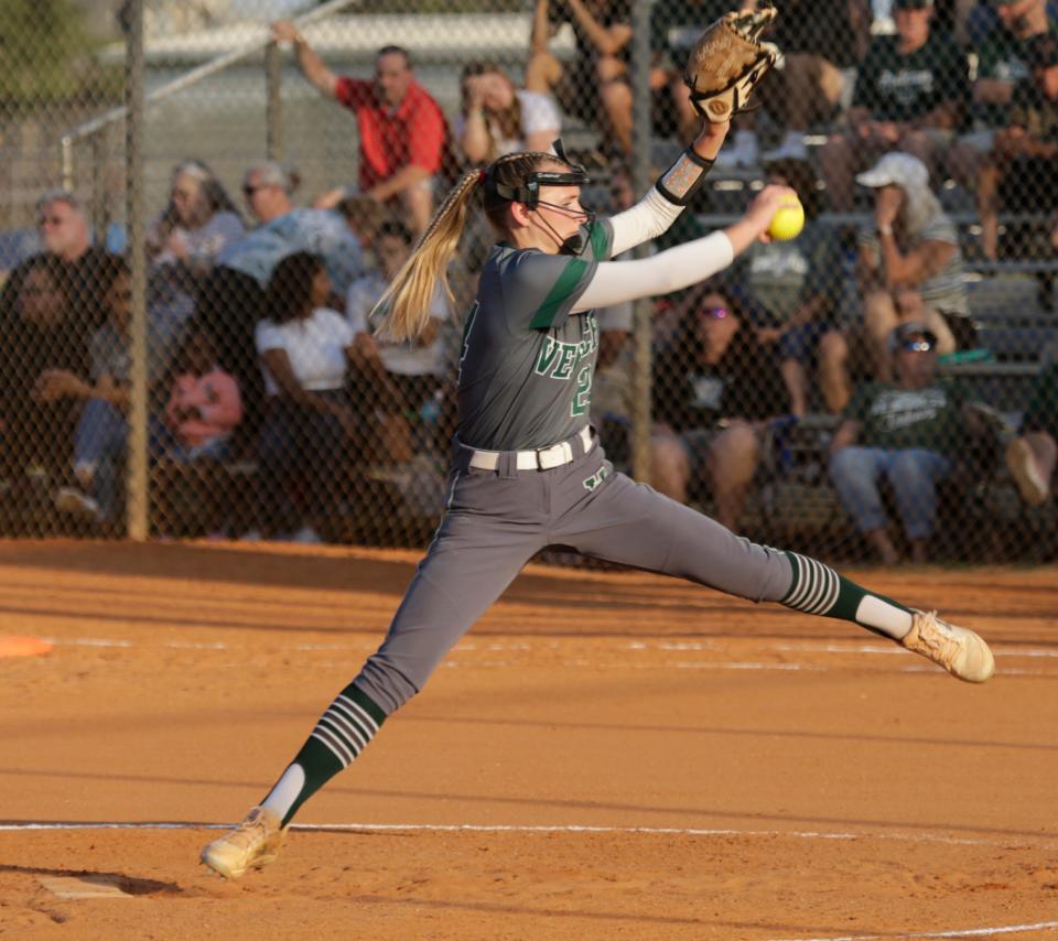 Venice's Layne Preece delivers a pitch against Lakewood Ranch in the Class 7A-District 8 softball final Thursday night at Lakewood Ranch High.