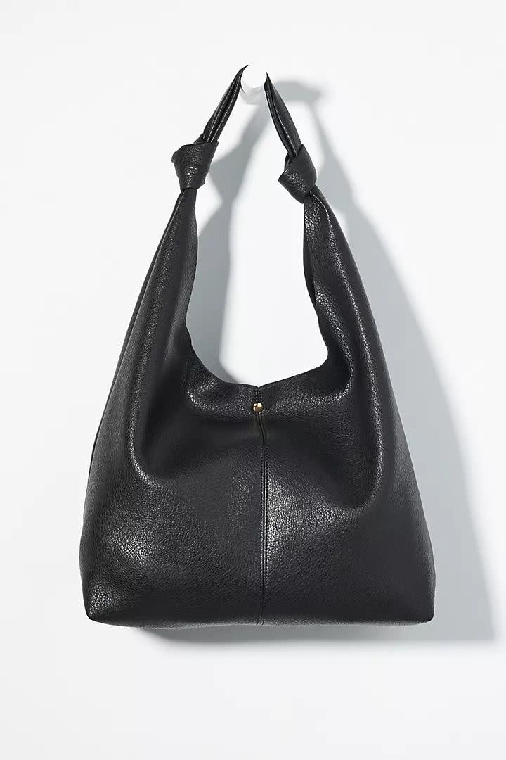 <p><a href="https://go.redirectingat.com?id=74968X1596630&url=https%3A%2F%2Fwww.anthropologie.com%2Fshop%2Fhybrid%2Fthe-love-knot-slouchy-bag%3Fcolor%3D001%26inventoryCountry%3DUS%26countryCode%3DUS%26device%3Dc%26network%3Dx%26gad_source%3D1%26gclid%3DCj0KCQjw_qexBhCoARIsAFgBletbYaTN6LDhlYgWVw6gOUHmYByG7pFlBc-i9--5Ko6KYKJ-nTlkl1AaAlIeEALw_wcB%26gclsrc%3Daw.ds%26type%3DSTANDARD%26size%3DOne%2BSize%26quantity%3D1%26reviewPage%3D2%26reviewSort%3DsubmissionTime%253Adesc&sref=https%3A%2F%2Fwww.cosmopolitan.com%2Fstyle-beauty%2Ffashion%2Fg60385771%2Fbest-everyday-bags%2F" rel="nofollow noopener" target="_blank" data-ylk="slk:Shop Now;elm:context_link;itc:0;sec:content-canvas" class="link ">Shop Now</a></p><p>Love Knot Slouchy Bag</p><p>Anthropologie</p><p>$98.00</p>