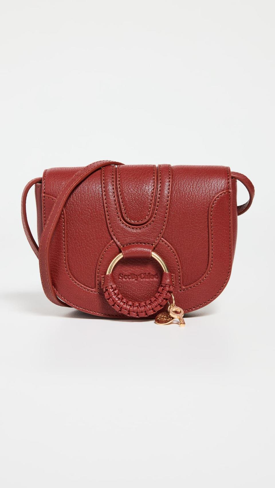 <p><a href="https://go.redirectingat.com?id=74968X1596630&url=https%3A%2F%2Fwww.shopbop.com%2Fhana-mini-saddle-bag-see%2Fvp%2Fv%3D1%2F1591524978.htm&sref=https%3A%2F%2Fwww.cosmopolitan.com%2Fstyle-beauty%2Ffashion%2Fg43376665%2Fsaddle-bags%2F" rel="nofollow noopener" target="_blank" data-ylk="slk:Shop Now;elm:context_link;itc:0;sec:content-canvas" class="link ">Shop Now</a></p><p>See By Chloe Hana Mini Saddle Bag</p><p>$360.00</p><p>shopbop.com</p>