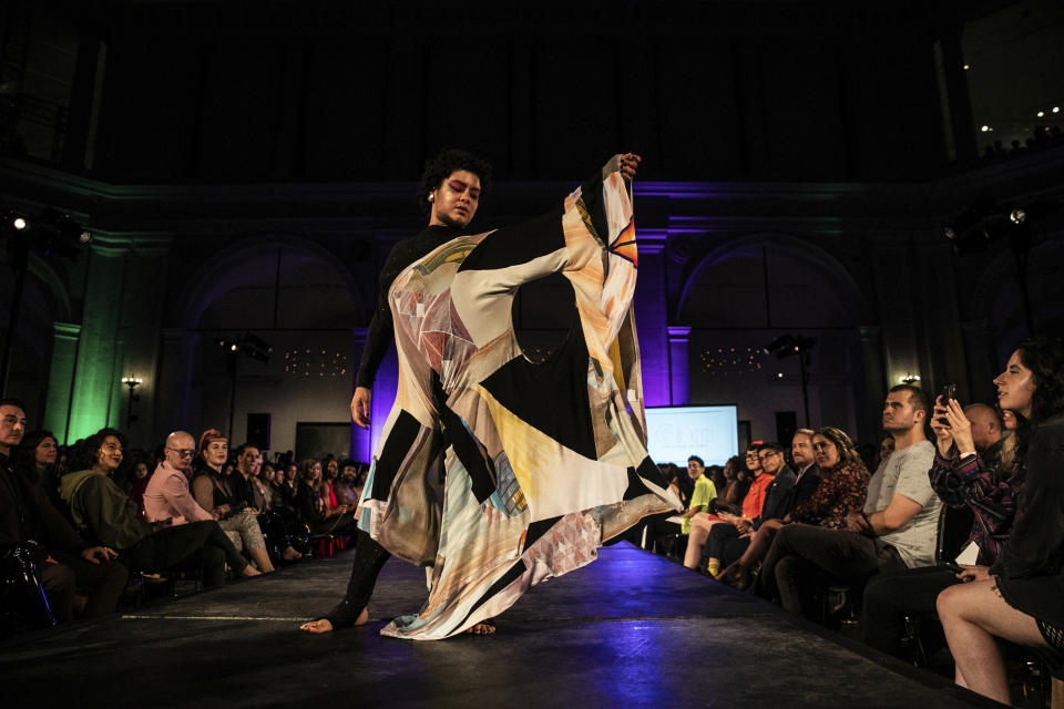 The Cilium collection is modeled during the dapperQ fashion show at the Brooklyn Museum on Thursday, Sept. 5, 2019, in New York. (AP Photo/Jeenah Moon)