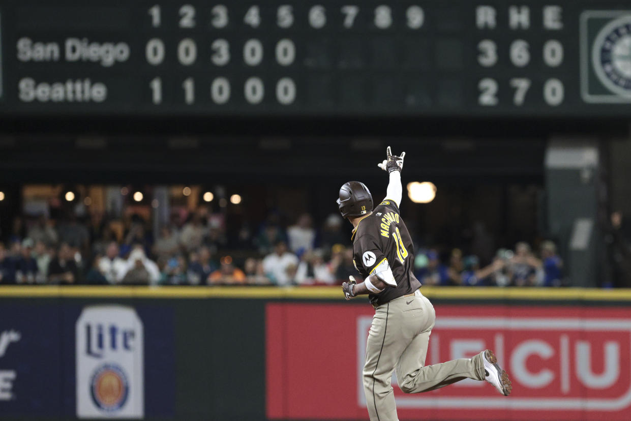 San Diego Padres' Manny Machado jogs the bases after hitting a two-run home run off Seattle Mariners starting pitcher George Kirby during the sixth inning of a baseball game, Tuesday, Sept. 10, 2024, in Seattle. (AP Photo/Jason Redmond)