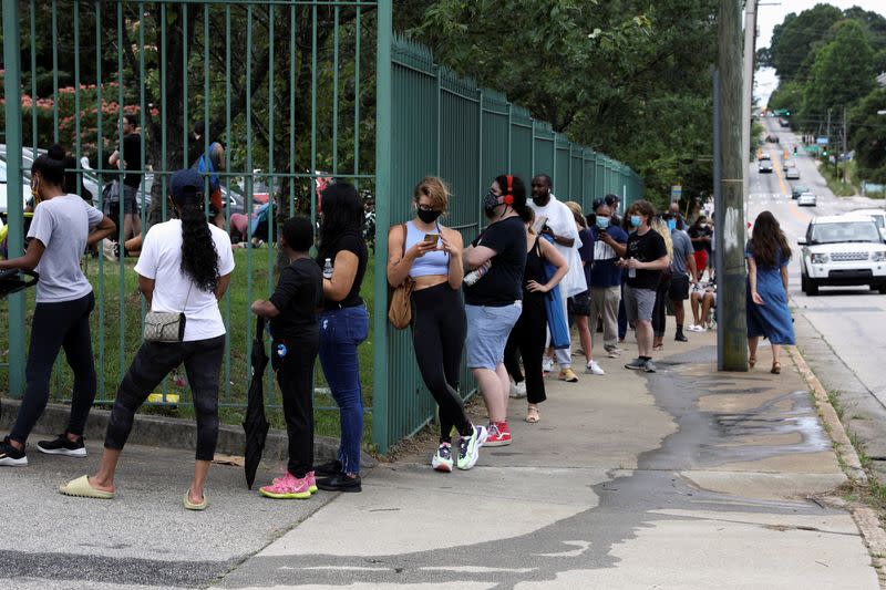 Voters line up to cast their ballots in Atlanta