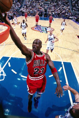 <p>Andrew D.Bernstein/NBAE/Getty </p> Michael Jordan