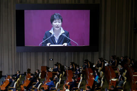 South Korean President Park Geun-hye delivers her speech on the 2017 budget bill during a plenary session at the National Assembly in Seoul, South Korea, October 24, 2016. REUTERS/Kim Hong-Ji