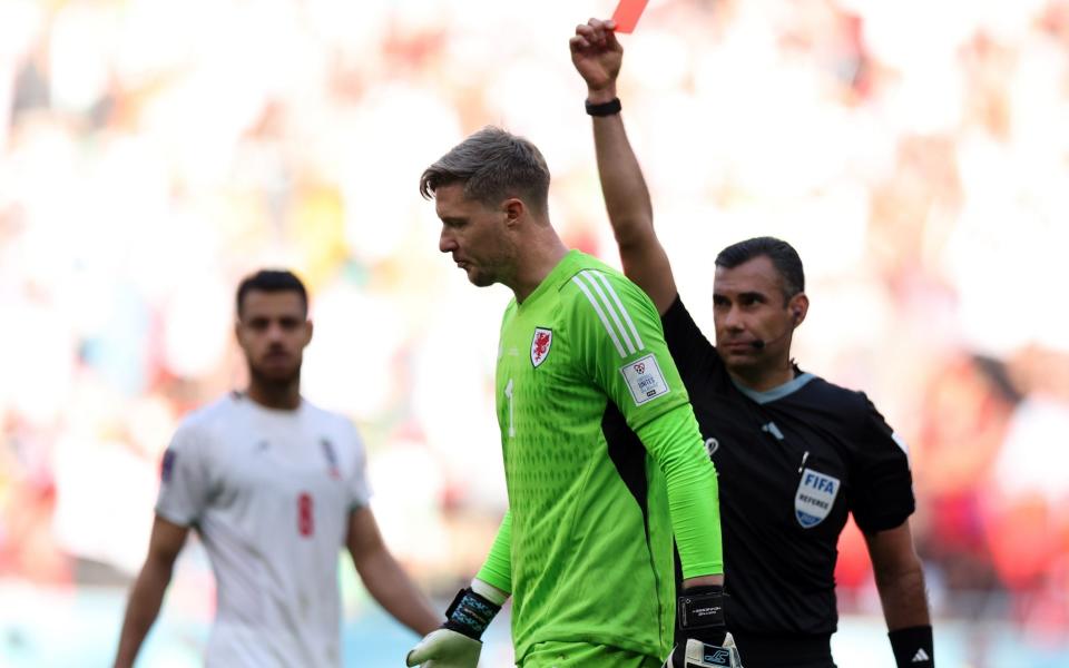 Wayne Hennessey of Wales is sent off by referee Mario Escobar during the FIFA World Cup Qatar 2022 Group B match between Wales and IR Iran at Ahmad Bin Ali Stadium - Getty Images