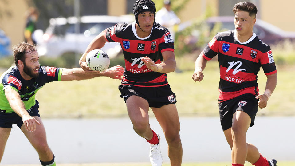 Joseph Suaalii, pictured here in action for North Sydney Bears against the Canberra Raiders.