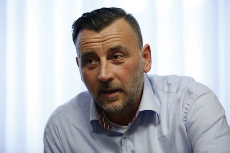 Lutz Bachmann, co-leader of anti-immigration group PEGIDA, a German abbreviation for "Patriotic Europeans against the Islamization of the West", is pictured during a Reuters interview in Dresden January 12, 2015. REUTERS/Fabrizio Bensch