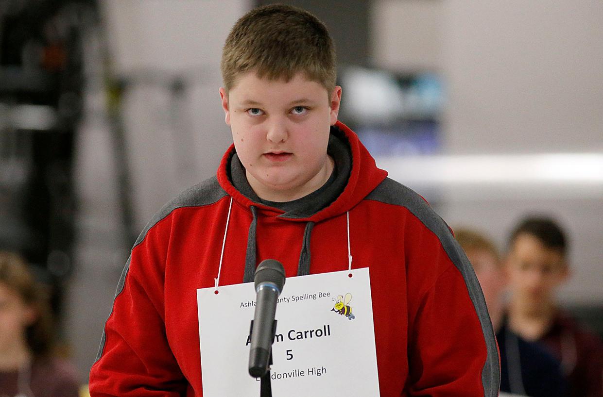 Loudonville High School's Adam Carroll spells a word during the 48th annual Ashland County Spelling Bee in January. The eighth-grader went on to win that evening, as he did as a sixth-grader.