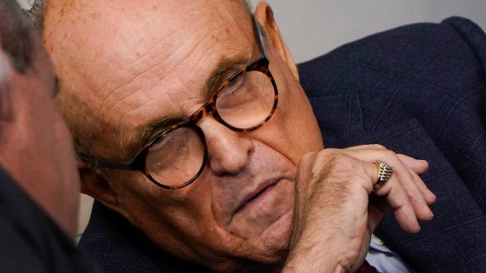 Former New York Mayor Rudy Giuliani, personal attorney for former president Donald Trump, is shown in September before he arrives for a news conference in the White House briefing room. (Photo by Joshua Roberts/Getty Images)