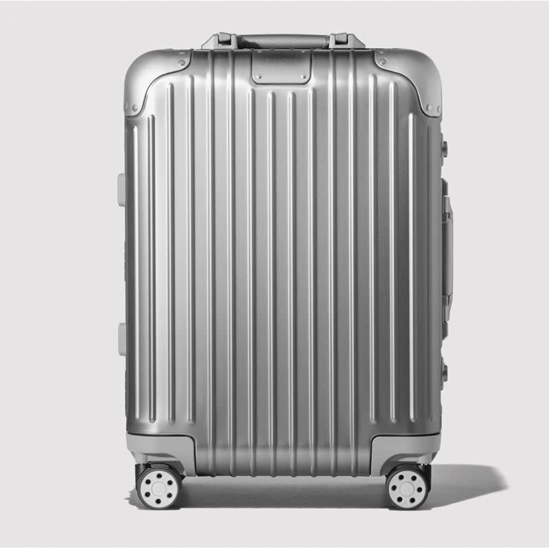 <p><a href="https://go.redirectingat.com?id=74968X1596630&url=https%3A%2F%2Fwww.rimowa.com%2Fus%2Fen%2Fluggage%2Fcolour%2Fsilver%2Fcabin%2F92553004.html%3FCJEVENT%3D860ab7fa1f5711ee83f5044d0a82b839%23start%3D1%26cjdata%3DMXxOfDB8WXww&sref=https%3A%2F%2Fwww.esquire.com%2Flifestyle%2Fg44462825%2Fbest-wedding-gifts%2F" rel="nofollow noopener" target="_blank" data-ylk="slk:Shop Now;elm:context_link;itc:0;sec:content-canvas" class="link ">Shop Now</a></p><p>Original Cabin Suitcase</p><p>$1430.00</p>