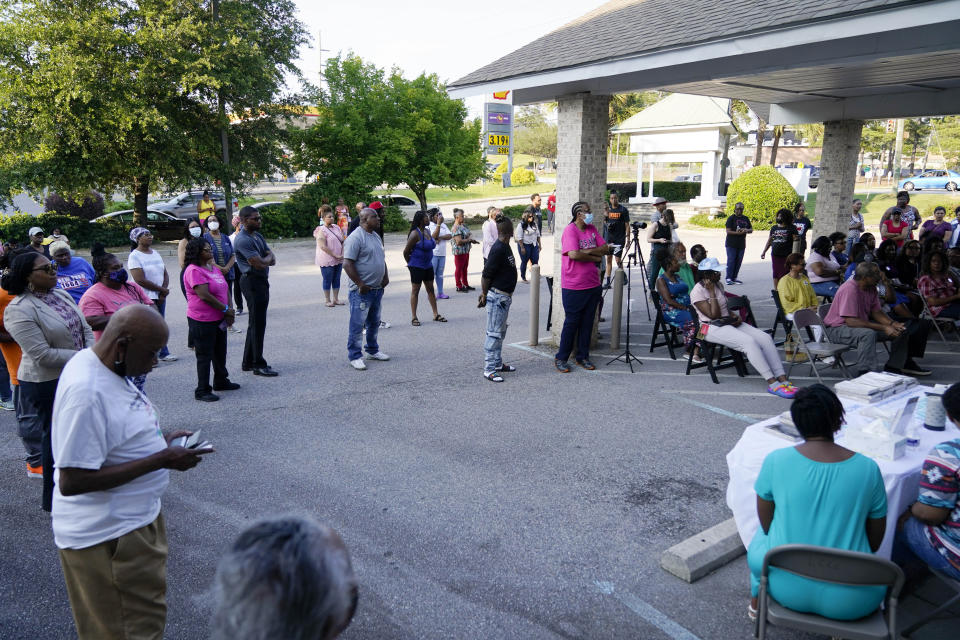 People participate during a prayer vigil in remembrance of Cyrus Carmack-Belton, Friday, June 2, 2023, in Columbia, S.C. Cyrus Carmack-Belton, a 14-year-old boy will be laid to rest less than one week after officials say a South Carolina gas station owner gunned him down in a killing that has prompted cries of racial profiling.(AP Photo/Erik Verduzco)