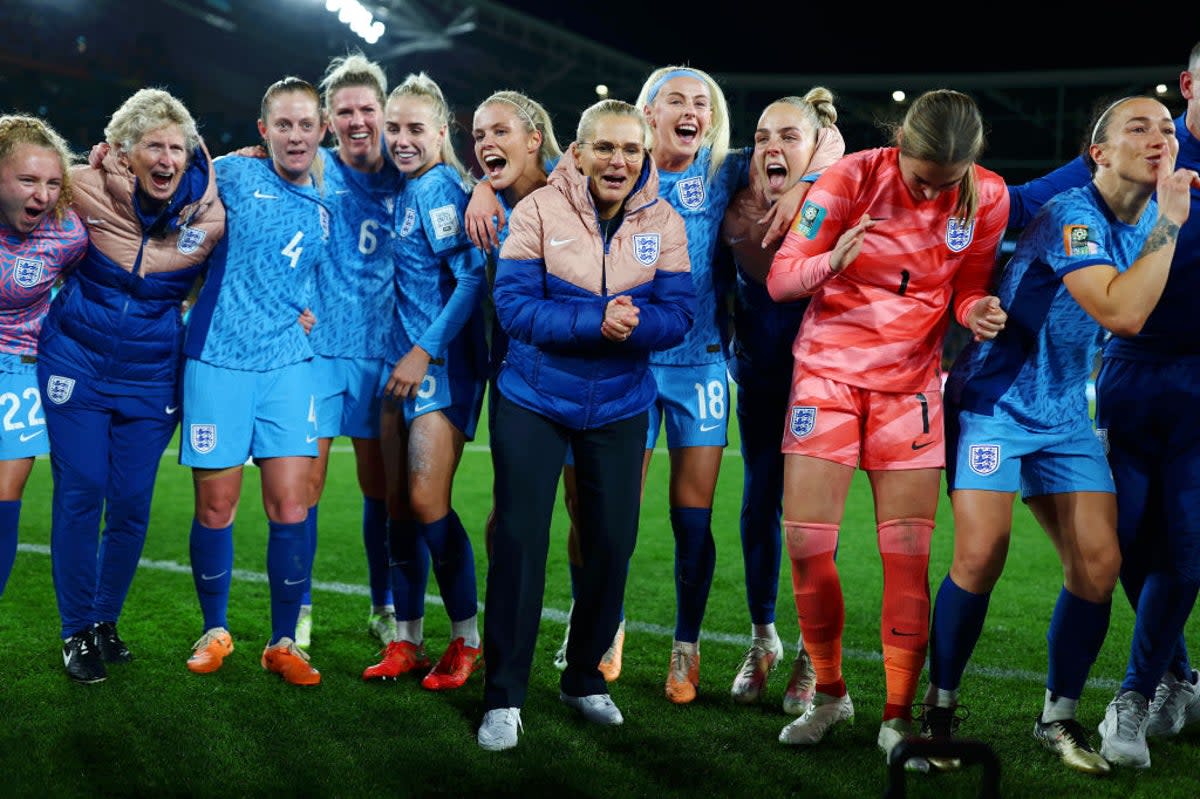 England manager Sarina Wiegman huddled with her team after going through to the Women’s World Cup final, scoring 3-1 against Australia (The FA via Getty Images)