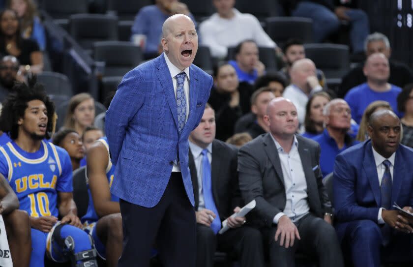 UCLA coach Mick Cronin instructs his players during a loss to North Carolina on Dec. 21.