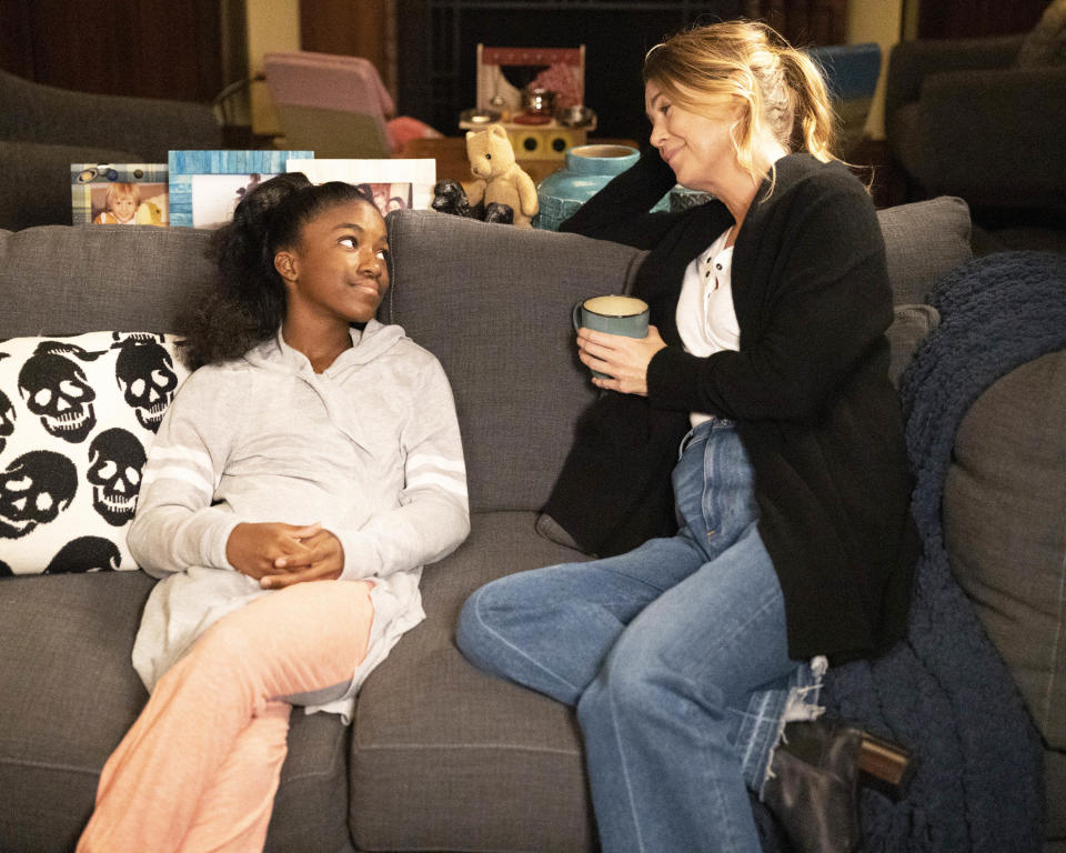 Zola and Meredith sitting on a couch