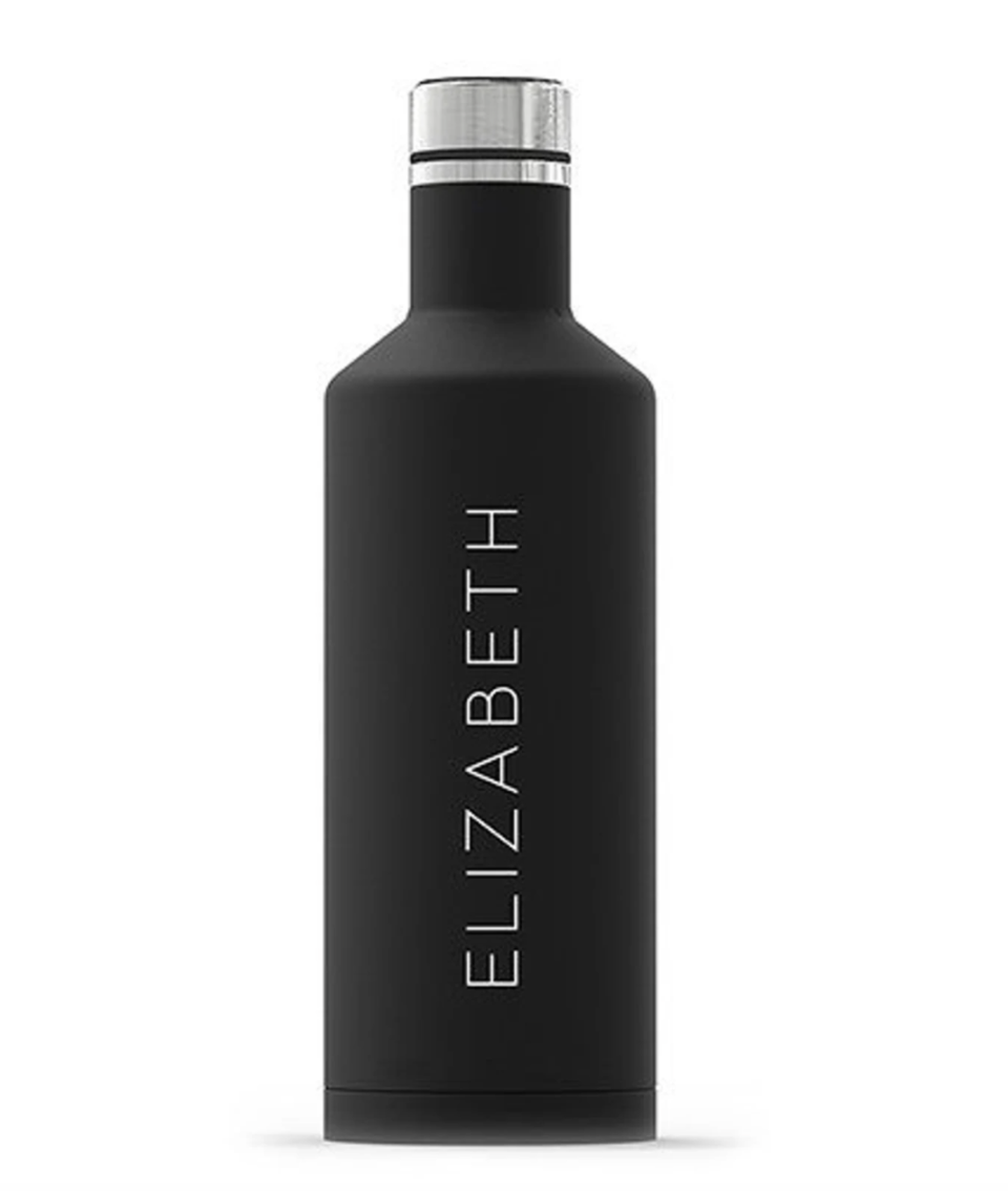 Personalized Water Bottle in black with elizabeth in writing (Photo via Etsy)