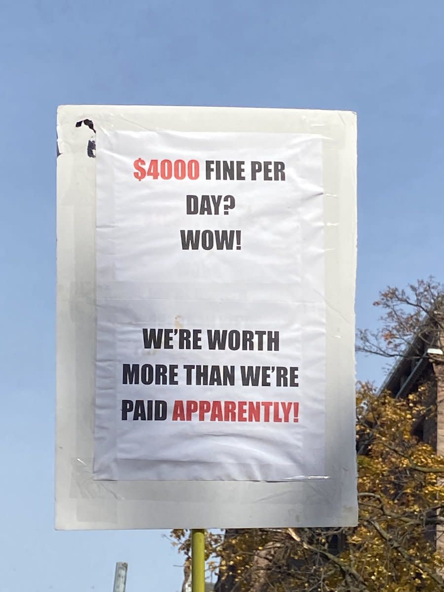 <p>A sign at Friday's protest in support of the some 55,000 CUPE education workers striking across Ontario.</p> 