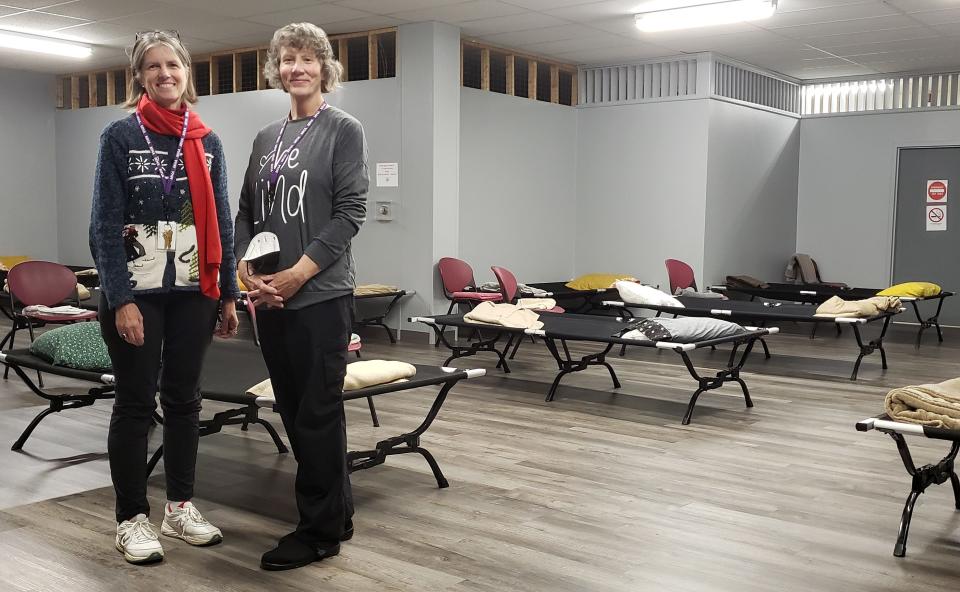 Betsy Wiest, at left, executive director of St. Patrick's Haven, and Pat Stucke, at right, executive director of the Mental Health Association of Northwestern Pennsylvania are shown, on Nov. 16, 2022, in the recently renovated 20-bed overflow shelter in the lower level at the MHA, 1101 Peach Street in Erie.