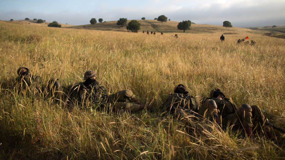 In this 2014 photo, Israeli soldiers in the Netzah Yehuda battalion are seen taking part in training in the Israeli-controlled Golan Heights, near the Syrian border. - Menahem Kahana/AFP/Getty Images/File