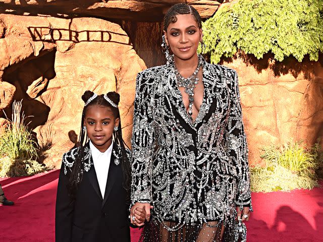 <p>Alberto E. Rodriguez/Getty</p> Blue Ivy Carter (L) and Beyonce Knowles-Carter attend the World Premiere of Disney's "THE LION KING"