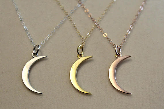 <p>Forget playing Santa — be Jack Pearson this holiday season! Like the dreamy dad from <em>This Is Us</em>, bestow this delicate moon-shaped necklace on the love of your life. It comes in gold, rose gold, or silver. The three adorable kids come separately.<br><strong>Buy: <a rel="nofollow noopener" href="https://www.etsy.com/listing/514043116/this-is-us-moon-necklace-mandy-moore?gpla=1&gao=1&&utm_source=google&utm_medium=cpc&utm_campaign=shopping_us_b-jewelry-necklaces-other&utm_custom1=f4f045dd-a619-4553-8066-a5e48577a31f&gclid=EAIaIQobChMIyb3Dgdff1gIVQh2BCh3K-g7-EAkYByABEgJwrvD_BwE&source=aw&utm_source=affiliate_window&utm_medium=affiliate&utm_campaign=us_location_buyer&awc=6220_1510608311_b28bcc55e54d468783ffb83de7ecdfc5&utm_content=202819" target="_blank" data-ylk="slk:Etsy/JWhiz" class="link ">Etsy/JWhiz</a></strong> </p>
